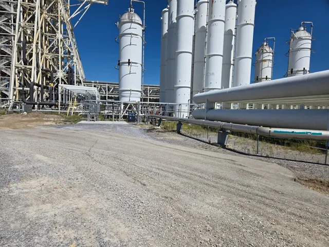 Prepared gravel surface beside tanks and pipework at a Rocket Engine Test Stand at John C. Stennis Space Center